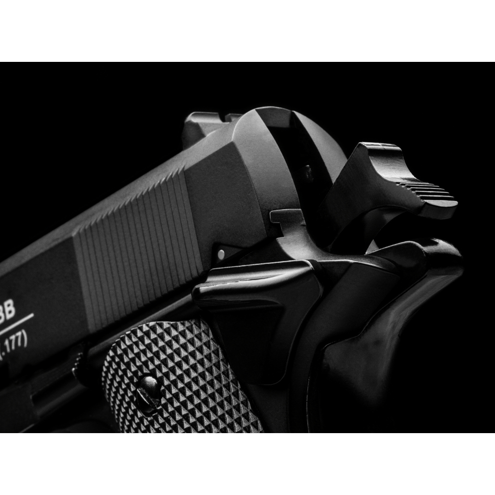 Explore the ASG 1911 US-C CO2 Blowback BB Pistol - a high-quality 1911 replica with blowback action, 18-round capacity, and 372fps velocity. Available at ReplicaAirguns.ca!
