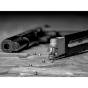 Explore the ASG 1911 US-C CO2 Blowback BB Pistol - a high-quality 1911 replica with blowback action, 18-round capacity, and 372fps velocity. Available at ReplicaAirguns.ca!